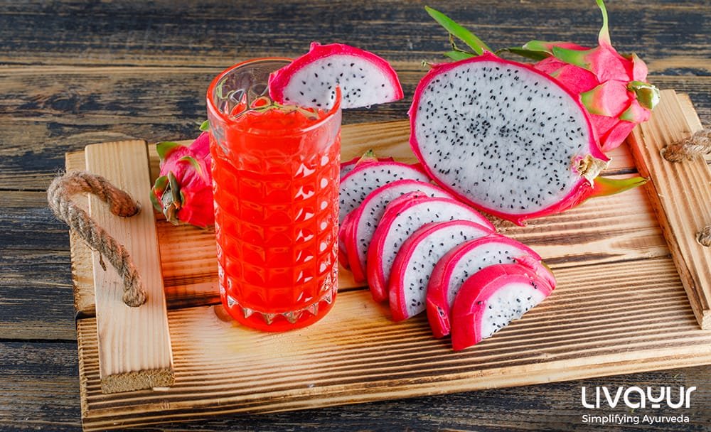 dragon-fruit-tray-with-juice-high-angle-view-wooden-table dragon fruit tray with juice high angle view wooden table